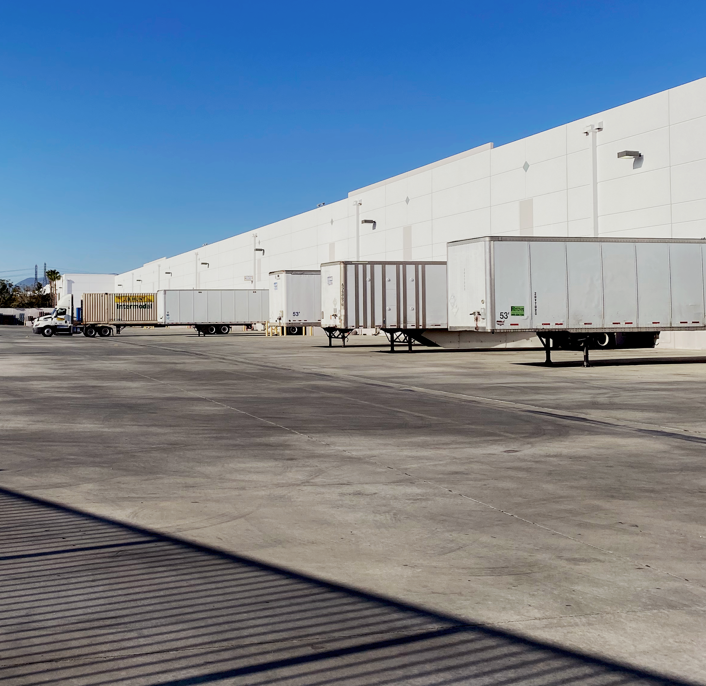 Truck fleet lined up by docking station